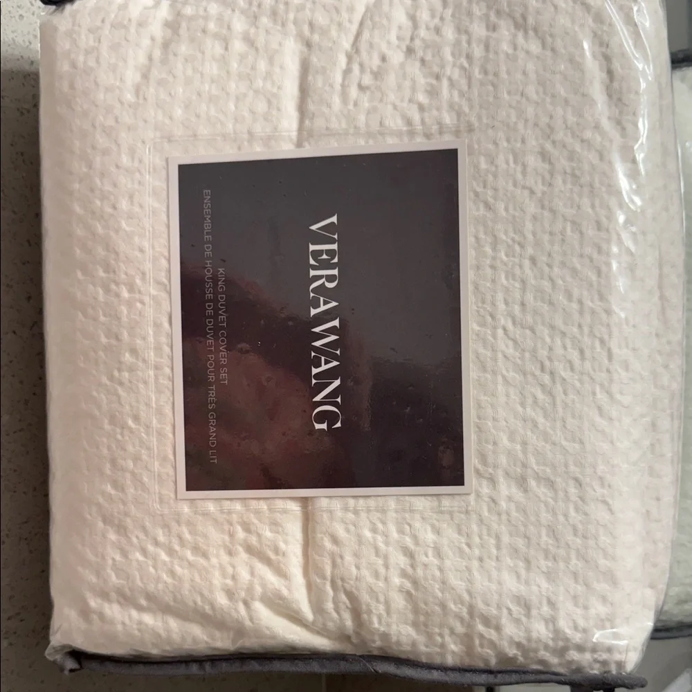 Vera Wang Ivory Textured Duvet Set includes pillow shams